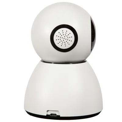 Caméra blanche en plastique avec tête rotative, haut-parleur circulaire visible à l’arrière et port micro-USB à la base. Aucun texte ou marque visible.