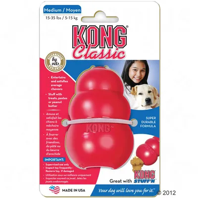 KONG Classic Medium 15–35 lbs / 5–15 kg, super trwała formuła, polecane przez weterynarzy. Produkt do wypełniania smakołykami, pastą lub masłem orzechowym. Wyprodukowano w USA.