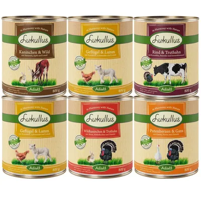 6 puszek Lukullus Adult 800 g: Kaninchen & Wild, Geflügel & Lamm, Rind & Truthahn, Wildkaninchen & Truthahn, Putenherzen & Gans. Widoczne ilustracje zwierząt i nazwy smaków na etykietach.