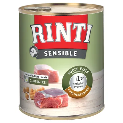 Konzerva Rinti Sensible, 100% Pute im Fleischanteil, nur 1 tierisches Protein, glutenfrei, pro citlivé psy, + Kichererbsen. Zobrazeny kousky masa a cizrna.