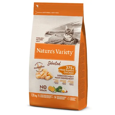 Упаковка корма для кошек Nature’s Variety Selected, 1,25 кг, надписи: 375 г free range chicken, deboned meat main ingredient, no grain, изображение курицы и овощей.