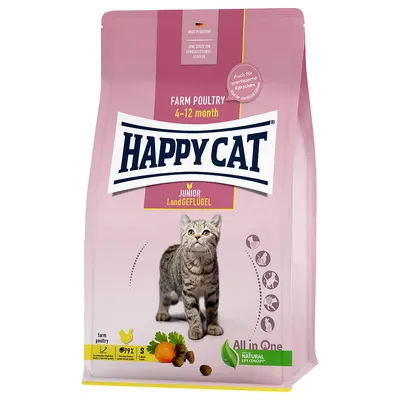 Hrană pentru pisici Happy Cat Junior Land Geflügel, Farm Poultry 4–12 month, imagine cu pisoi și ingrediente vizibile pe ambalaj. Text suplimentar în germană.