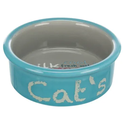 Turquoise keramische schaal met opschrift 'Cat's' en binnenin de tekst 'milk, cool fresh water'.