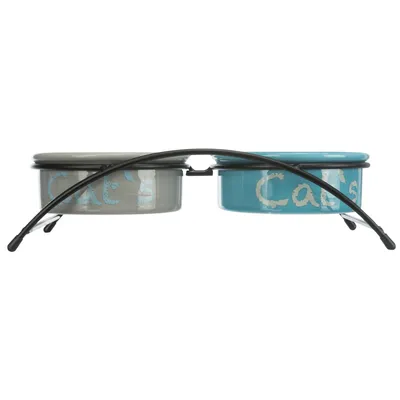 Dubbele voerbakset met metalen houder, twee keramische kommen in grijs en blauw met opschrift 'Cat's'.