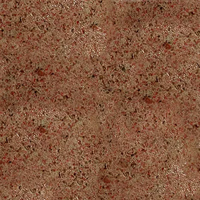 Close-up of a brown, grainy texture with red and dark accents. Material or surface not further specified.