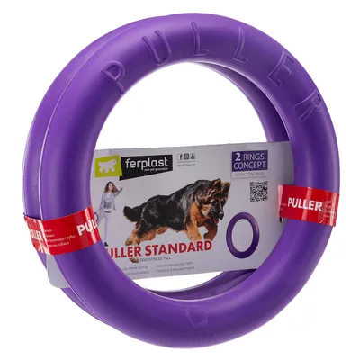 Ferplast Puller Standard, purple fitness ring for dogs. Contains 2 rings, floats and made of robust material. Packaging shows dog with ring in training.