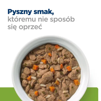 Miska z mokrą karmą dla zwierząt, widoczne kawałki mięsa i warzyw. Widoczny tekst: Pyszny smak, któremu nie sposób się oprzeć.