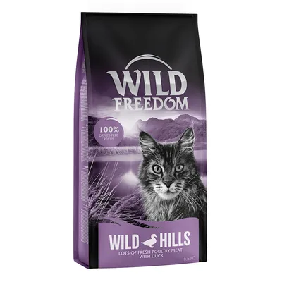 Wild Freedom Wild Hills kattenvoer, 100% grain-free recipe, lots of fresh poultry meat with duck, verpakking van 6,5 kg. Kattenkop en berglandschap zichtbaar op de zak.