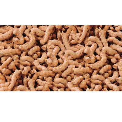 Гранулирана котешка тоалетна с неправилна форма, светлокафяв цвят, материалът изглежда като пресовани влакна или дървесина. Видими са само самите гранули.