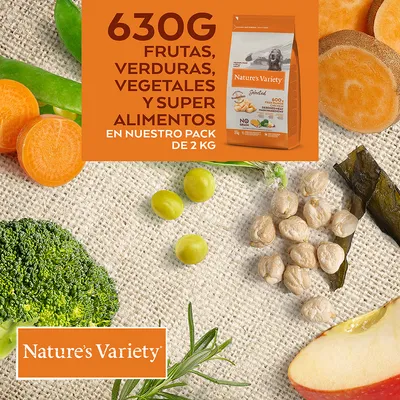 Nature’s Variety. 630G FRUTAS, VERDURAS, VEGETALES Y SUPER ALIMENTOS EN NUESTRO PACK DE 2 KG — текст на испанском языке, изображение упаковки и ингредиентов: брокколи, морковь, яблоко, нут.