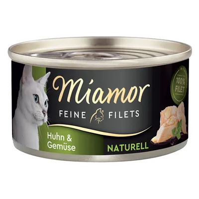 Miamor Feine Filets, kana ja vihannekset, naturell, 100 % filee. Kissanruoka purkissa, jossa valkoinen kissa ja kananfileepaloja.