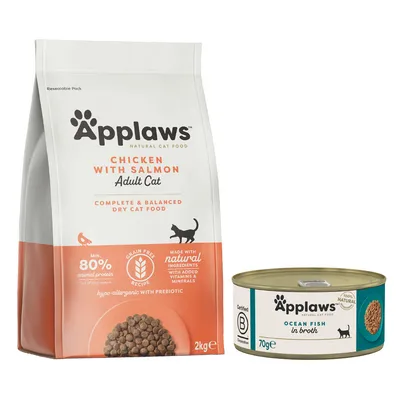 Pienso Applaws Chicken with Salmon Adult Cat 2 kg y lata Applaws Ocean Fish in Broth 70 g. Texto visible: 80 % proteína animal, sin cereales, ingredientes naturales, vitaminas y minerales.