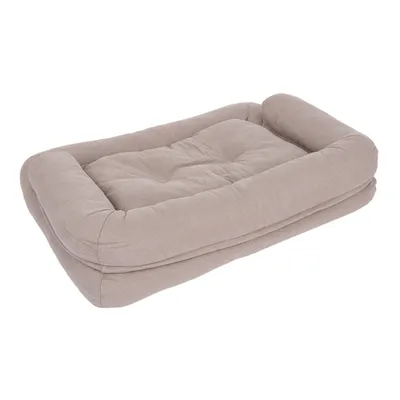 Coussin rectangulaire beige pour animal, avec rebords rembourrés et surface matelassée. Matière textile visible, sans marque ni texte apparent.