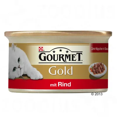 Lata de comida para gatos Gourmet Gold mit Rind, com imagem de um gato branco e pedaços de carne em molho. Texto visível: Zarte Häppchen in Sauce.