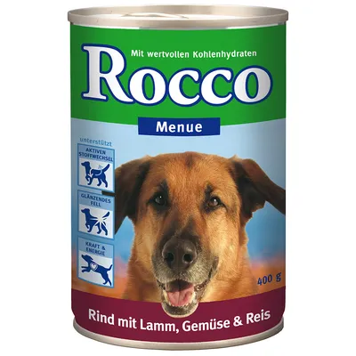 Rocco Menue våtfoder för hund, 400 g. Synlig text: Rind mit Lamm, Gemüse & Reis. Ikoner med tysk text: AKTIVEN STOFFWECHSEL, GLÄNZENDES FELL, KRAFT & ENERGIE.