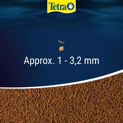Tetra. Velikost granulí cca 1–3,2 mm, zobrazeny hnědé krmné granule.