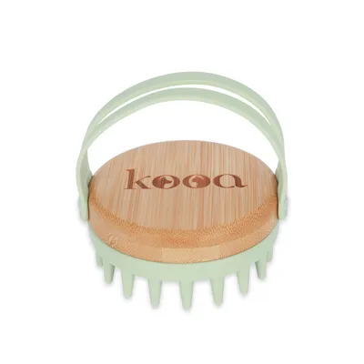 kooa massage brush with bamboo surface and green silicone bristles, ergonomic handle for pet care.