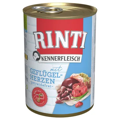 Scatola di cibo per cani Rinti Kennerfleisch mit Geflügelherzen, getreidefrei. Immagine di carne e cuori di pollame sulla confezione. Testo in tedesco visibile.