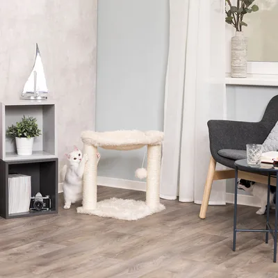 Cat tree with two sisal posts, plush lying surface and play ball. White room with decorations such as plant, camera and furniture.