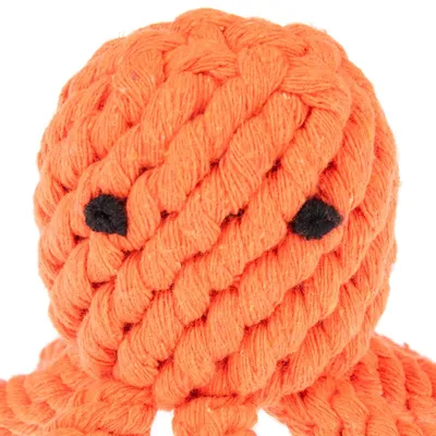 Brinquedo para animais em forma de polvo, feito de corda grossa laranja com olhos pretos visíveis.