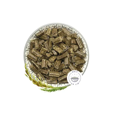 Bowl with compressed green pellets, next to wheat ears and '24/7 Ad Lib' symbol with feed bowl.