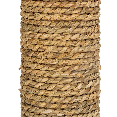 Braided natural material made from brown plant fibres, suitable for scratching post or furniture covering.