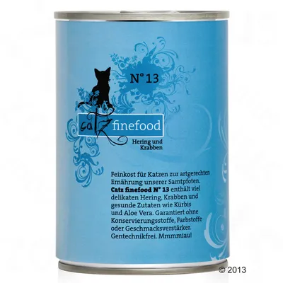Консерва Catz finefood N°13 Hering und Krabben. Текст на немски: Feinkost für Katzen, съдържа херинга и раци, без консерванти, оцветители или овкусители, Gentechnikfrei.