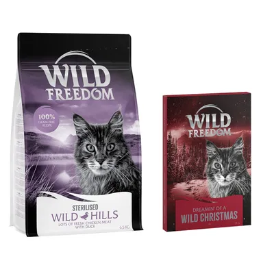Balení Wild Freedom Sterilised Wild Hills 6,5 kg s textem '100% grain-free recipe' a krabička Wild Freedom Dreamin' of a Wild Christmas 18 g. Obě s obrázkem kočky.
