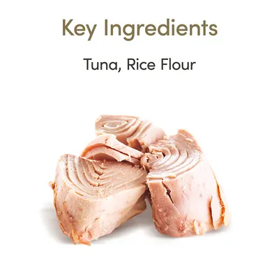 Teksti: Key Ingredients. Tuna, Rice Flour. Kuvassa paloja tonnikalaa valkoisella taustalla. Teksti englanniksi.