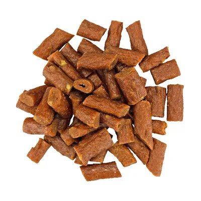 Close-up of brown, rectangular dog snacks in piece form.