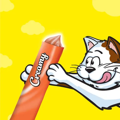 Illustration of a cartoon cat holding an orange tube labelled 'Creamy' with brown paste coming out, suggesting a creamy treat product.