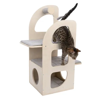 Wooden scratching post with three levels, grey padded surfaces and play tube. Cat climbing through opening on middle level.
