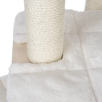 Cat tree with sisal-wrapped posts and soft white plush base.
