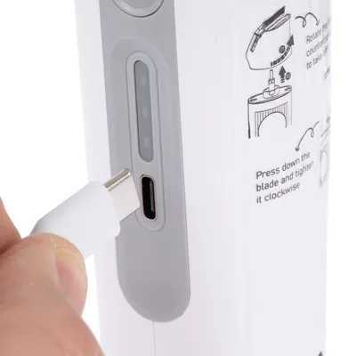 USB-C cable inserted into device charging port. Diagram shows blade assembly instructions: turn counterclockwise, press, and tighten clockwise.