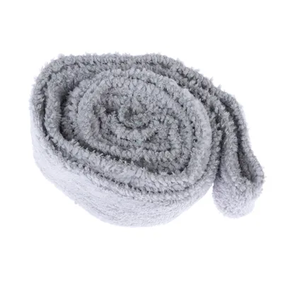Grey, rolled fabric tape with a fluffy texture, suitable for various uses.