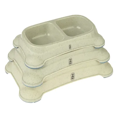 Boluri de hrană suprapuse din plastic crem cu două compartimente și logo Trixie, potrivite pentru hrană și apă.