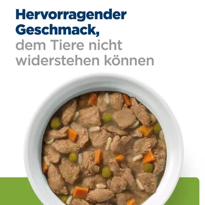 Excellent taste that animals cannot resist. Shown: bowl with meat pieces, peas, carrots and rice in sauce.