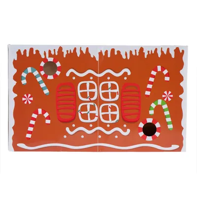 Lebkuchenhaus-Design mit Zuckerstangen, Fenstern und dekorativen Mustern auf orangefarbenem Hintergrund.