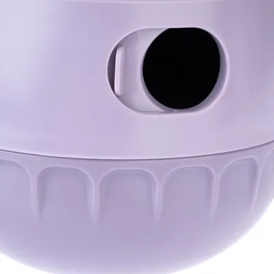 Lila plastbehållare med rund öppning och räfflad design, lämplig för förvaring eller som leksak.