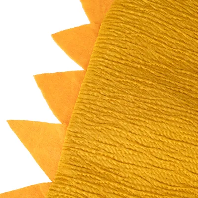 Close-up of yellow fabric with a textured surface and orange felt tips, possibly part of a costume or accessory.