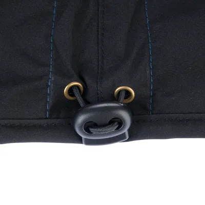 Close-up of black fabric with blue stitching, metal eyelets and an adjustable plastic drawstring.
