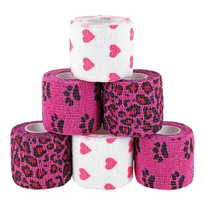 Sex självhäftande bandage i rosa och vitt med hjärt- och tassmönster, lämpliga för djurvård eller bandage.