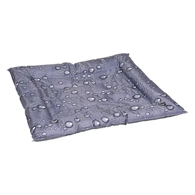 Cojín gris para mascotas con diseño de gotas de agua, forma rectangular y bordes acolchados.