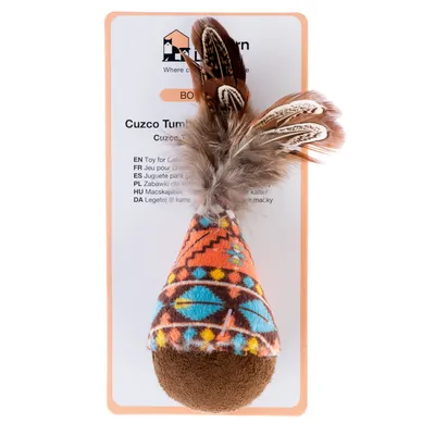 Jeu pour chat Cuzco Tumbler, peluche colorée avec plumes, sur carte de présentation. Marque visible : Aumüller. Texte multilingue sur l'emballage.