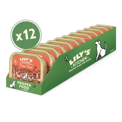 Tray containing 12 packs of Lily's Kitchen Puppy Recipe proper food for dogs, each pack labelled 8+ weeks, 150g.