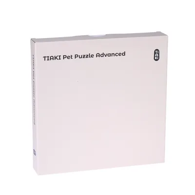 Packaging with the inscription 'TIAKI Pet Puzzle Advanced'.