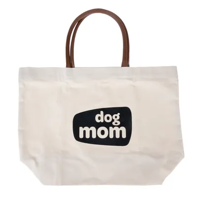 Borsa in tessuto beige con manici marroni e stampa nera 'dog mom'.