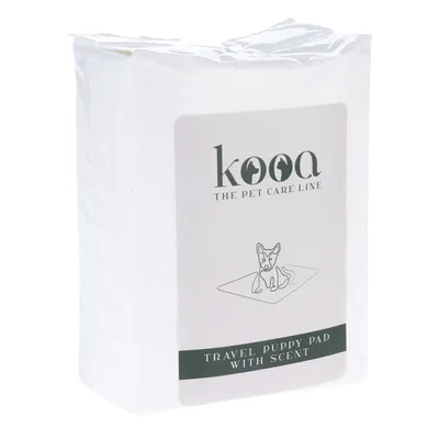 kooa The Pet Care Line. Travel Puppy Pad mit Duft, Verpackung zeigt Illustration eines Hundes auf einer Matte.