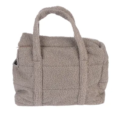 Sac de transport en tissu effet laine bouclée beige, deux anses, fermeture zippée sur le dessus, poche latérale visible.