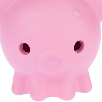 Jouet pour animal en forme de tête de cochon rose, deux trous visibles à l’avant, matière plastique ou caoutchouc. Aucun texte ni marque visible.